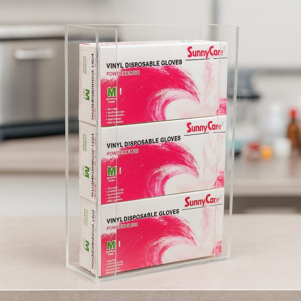 Clear acrylic glove box holder with three boxes, mounted in a doctor's office with side acrylic strips to keep boxes secure