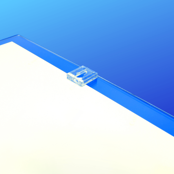 Folded acrylic frame for mounting on walls with universal key hole attachment
